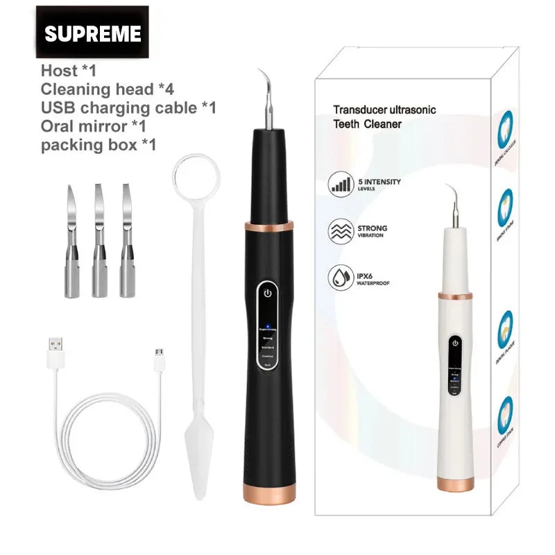 Ultrasonic tooth cleaner for pets with cleaning heads, USB cable, and oral mirror in a sleek package.